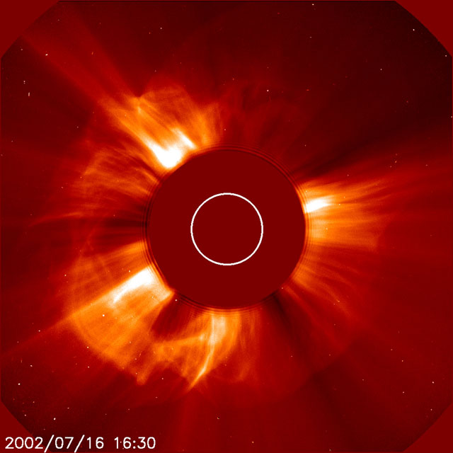 Composit of images of  the June 6, 2000 solar flare taken in white ligh tand ultraviolet (TRACE)