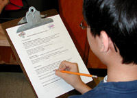 Boy with clipboard keeping a Space Weather Journal